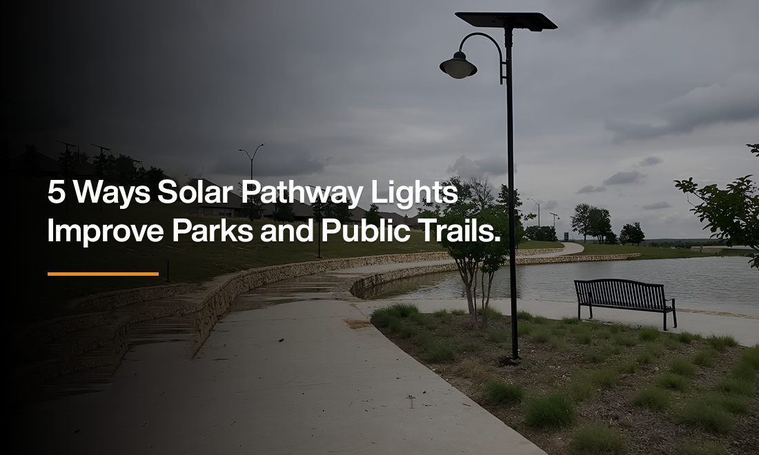 Solar pathway light installed along a park trail with benches and greenery, showcasing how solar lighting improves safety and usability of public spaces.
