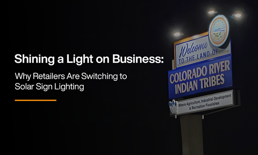 Illuminated retail signboard powered by solar lighting at night with the text "Shining a Light on Business: Why Retailers Are Switching to Solar Sign Lighting