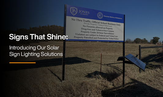 Commercial sign powered by solar lighting solution installed on a roadside billboard, showcasing off-grid LED illumination system for businesses.