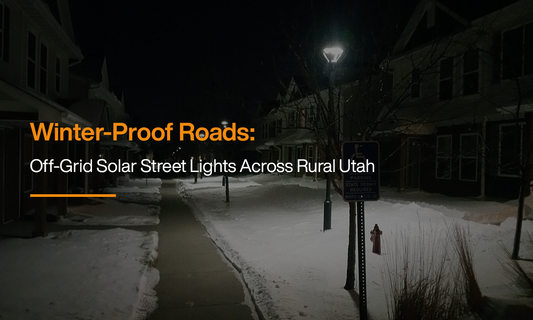 Snow-covered rural Utah street illuminated by off-grid solar street lights, showcasing cold-weather LifePO4 battery performance and reliable roadway lighting.